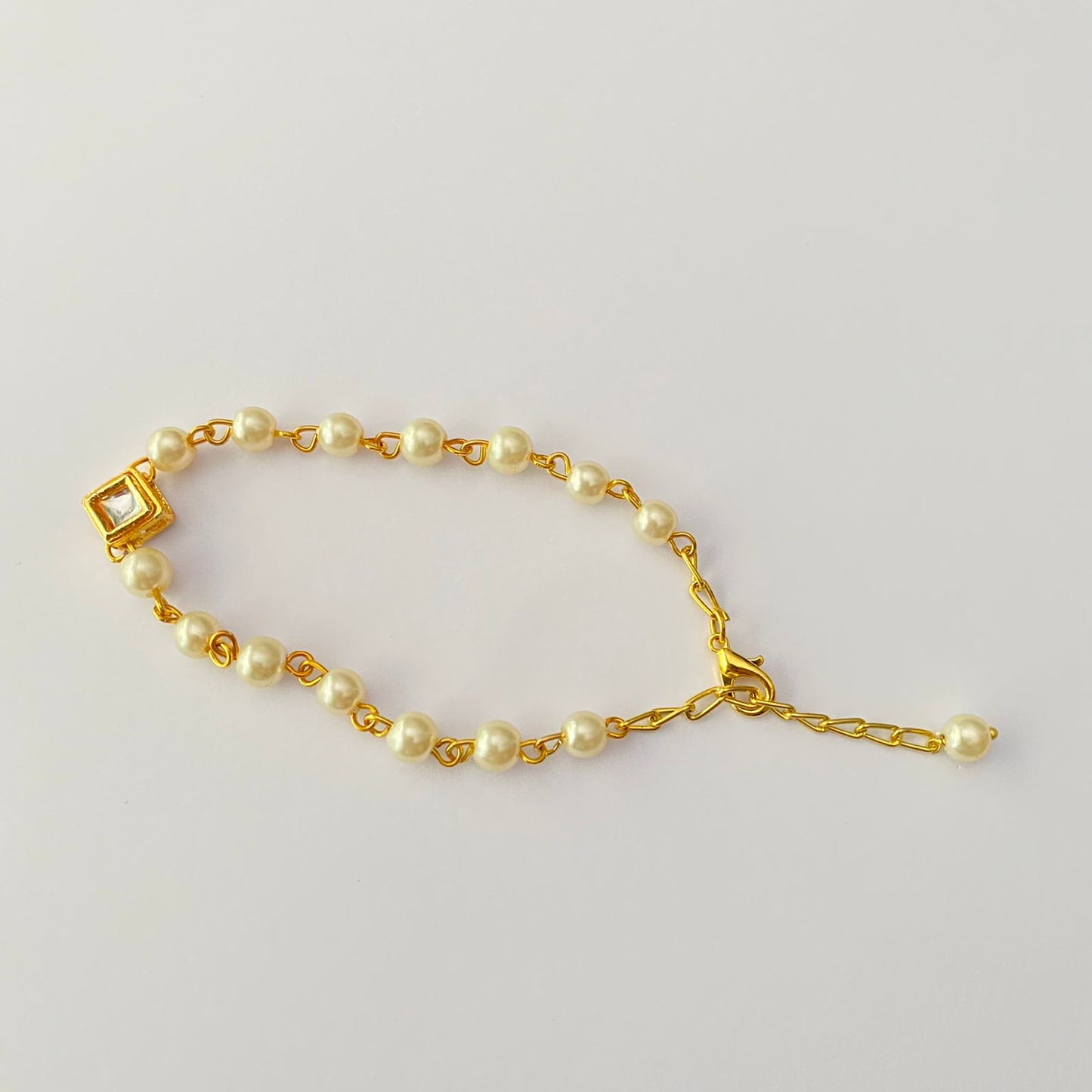KUNDAN GOLD PLATED CHAIN WITH PEARL ADJUSTABLE LUMBA RAKHI