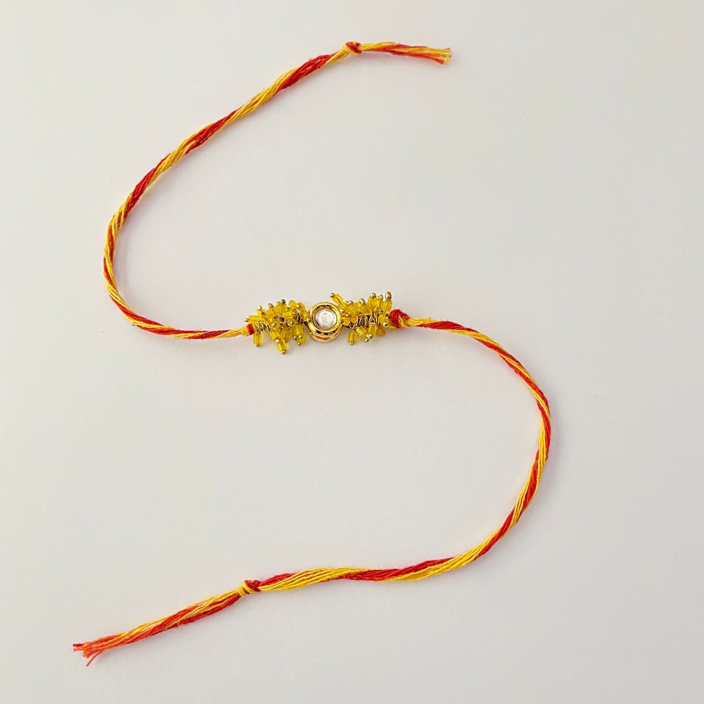 Polki with yellow moti latest Rakhi for men