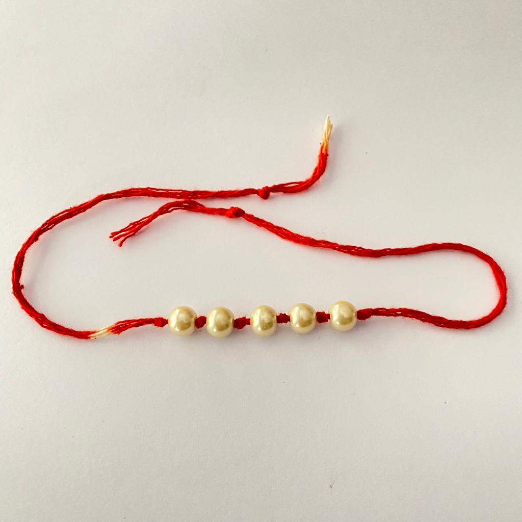 WHITE PEARL TRADITIONAL RAKHI