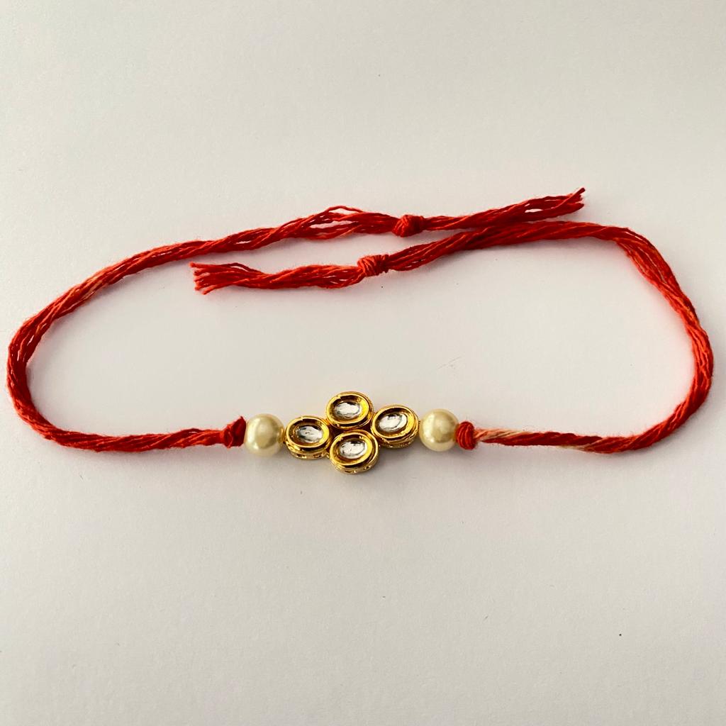 KUNDAN POLKI GOLD PLATED WITH PEARL RAKHI FOR MEN