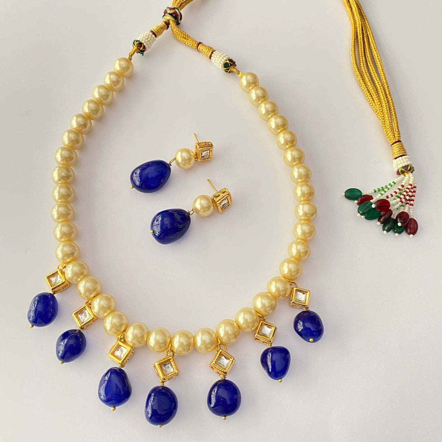 OFF WHITE PEARL BLUE SAPPHIRE KUNDAN GOLD PLATED NECKLACE WITH EARRING