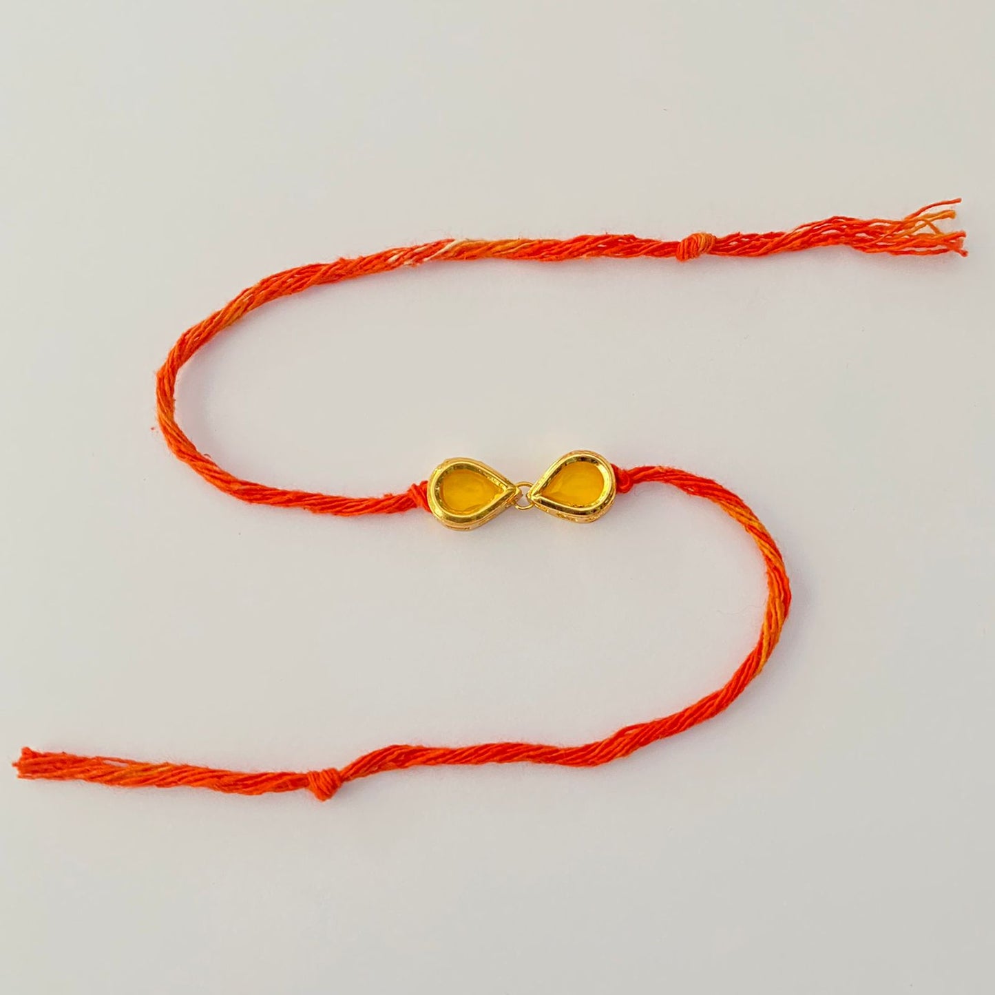YELLOW KUNDAN POLKI RAKHI