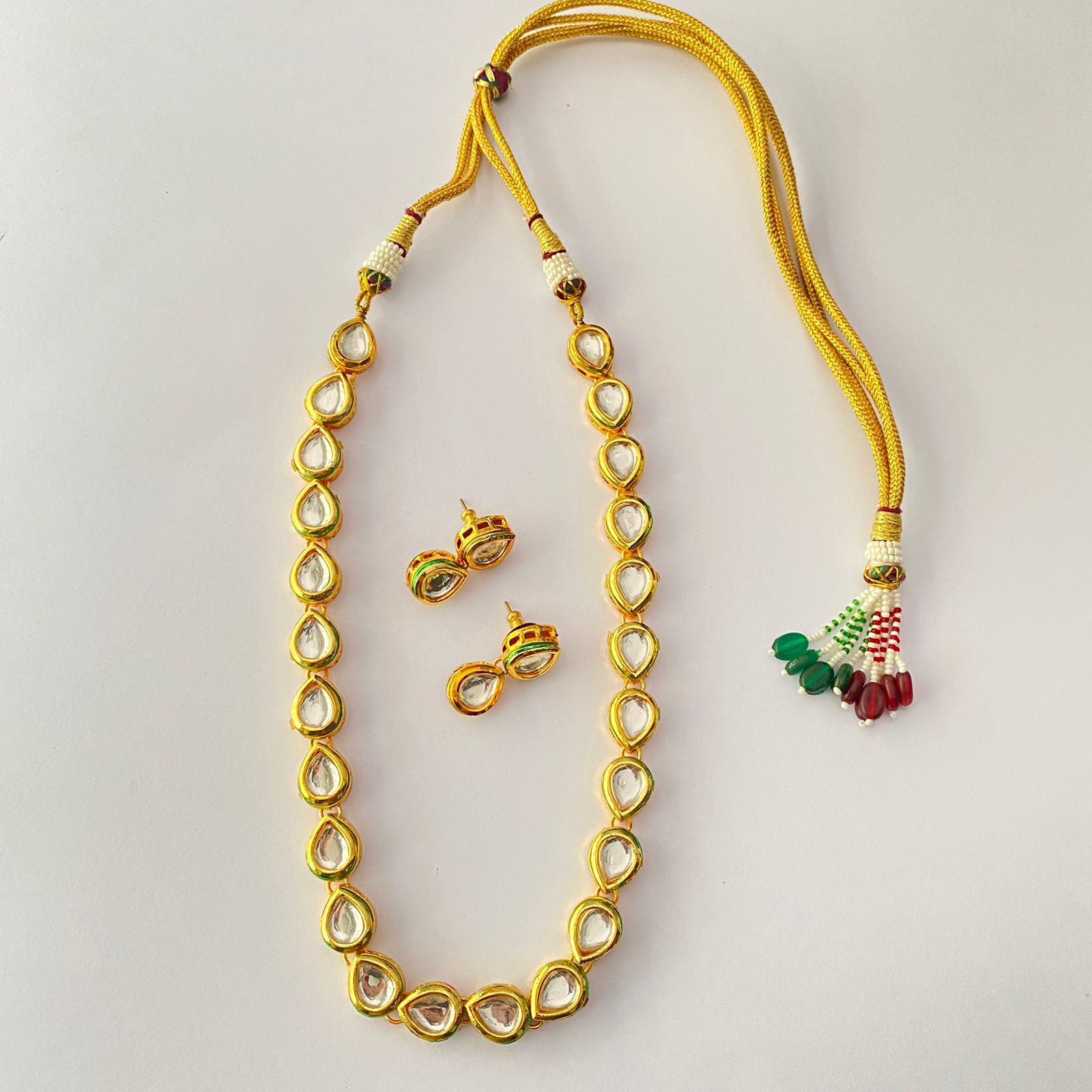 Kundan on sale emerald jewellery