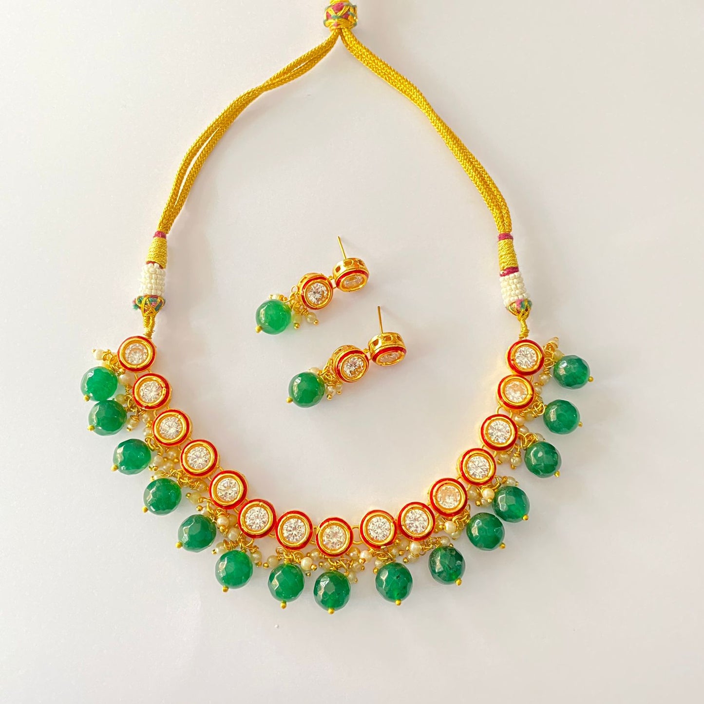 Ruby Kundan Emerald Pearl Necklace Set.