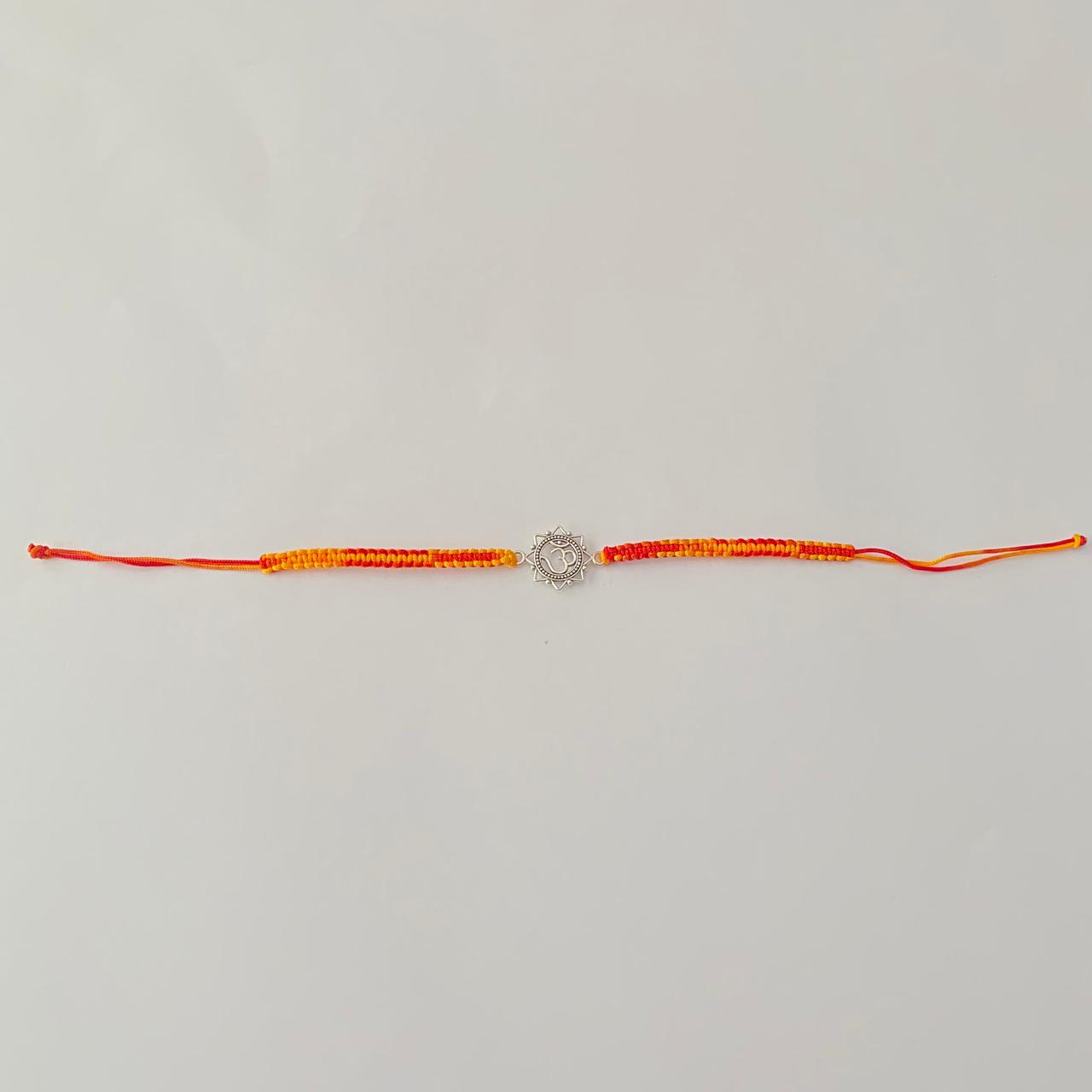 Pure silver Om Rakhi