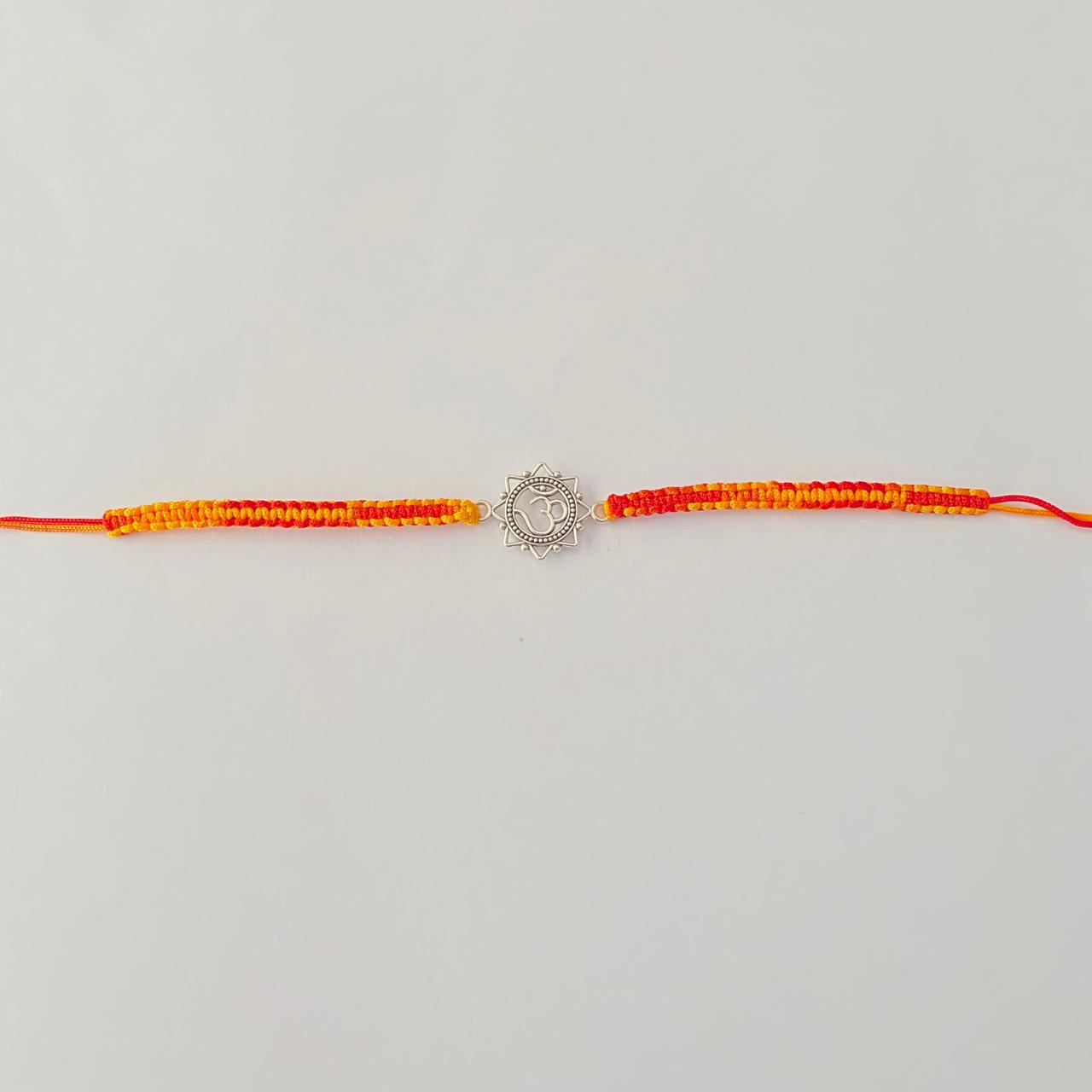 Pure silver Om Rakhi