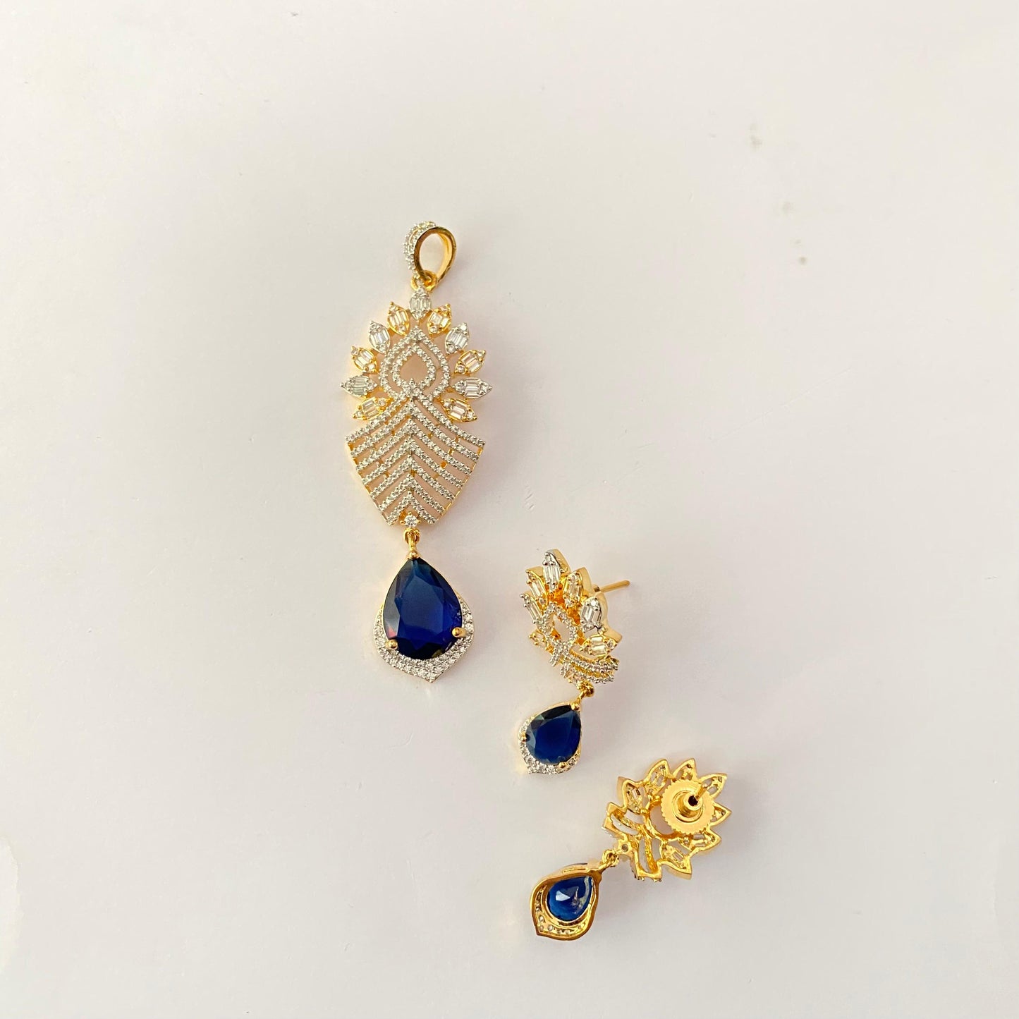Gold plated A.D with Blue drop stone Pendant set