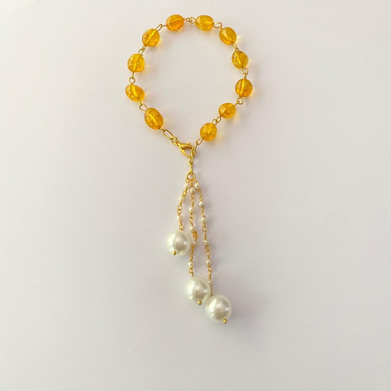 GOLD PLATED CHAIN YELLOW STONE LUMBA RAKHI FOR WOMEN