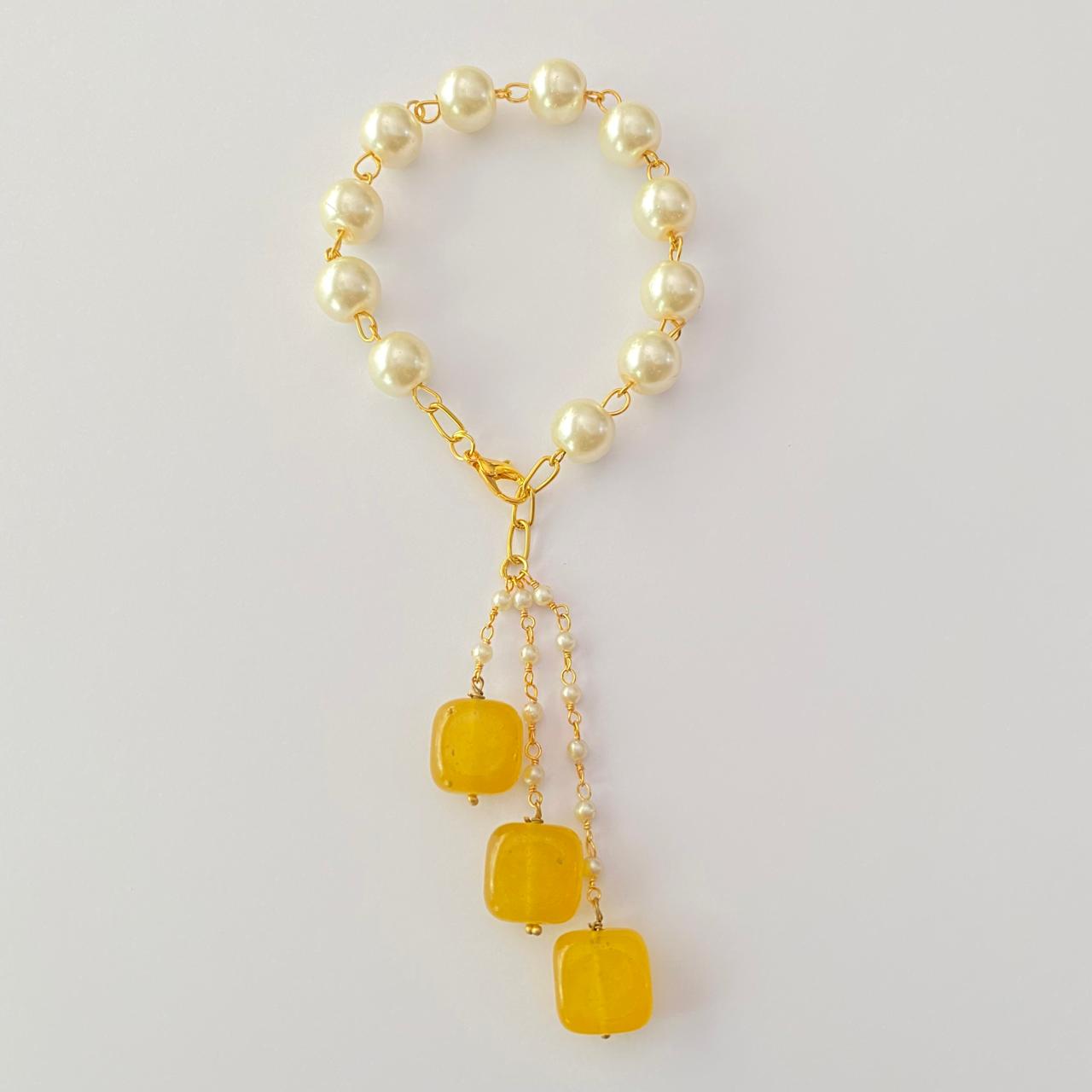 PEARL LUMBA RAKHI WITH YELLOW DROP STONE FOR WOMEN