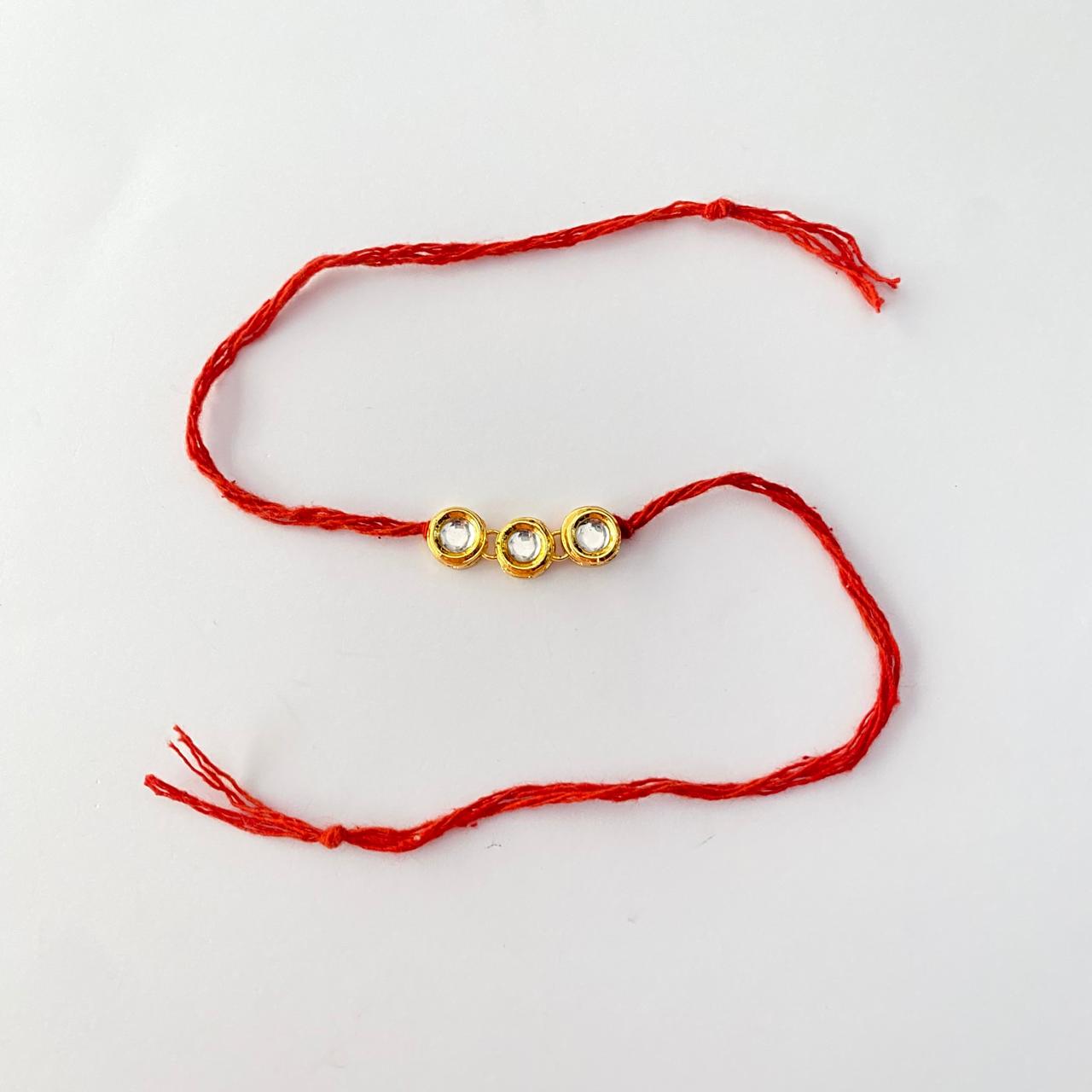 Round Shape Gold Plated Kundan Rakhi