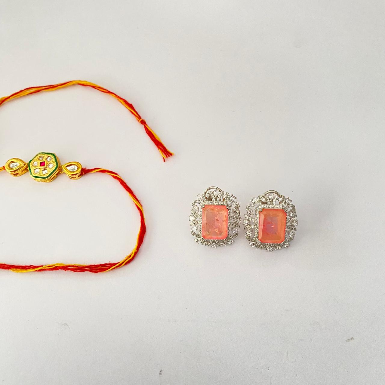 Central Hexagonal Design with a Red Stone Kundan Gold Plated Rakhi with Pink Stone Silver Plated Stud Combo