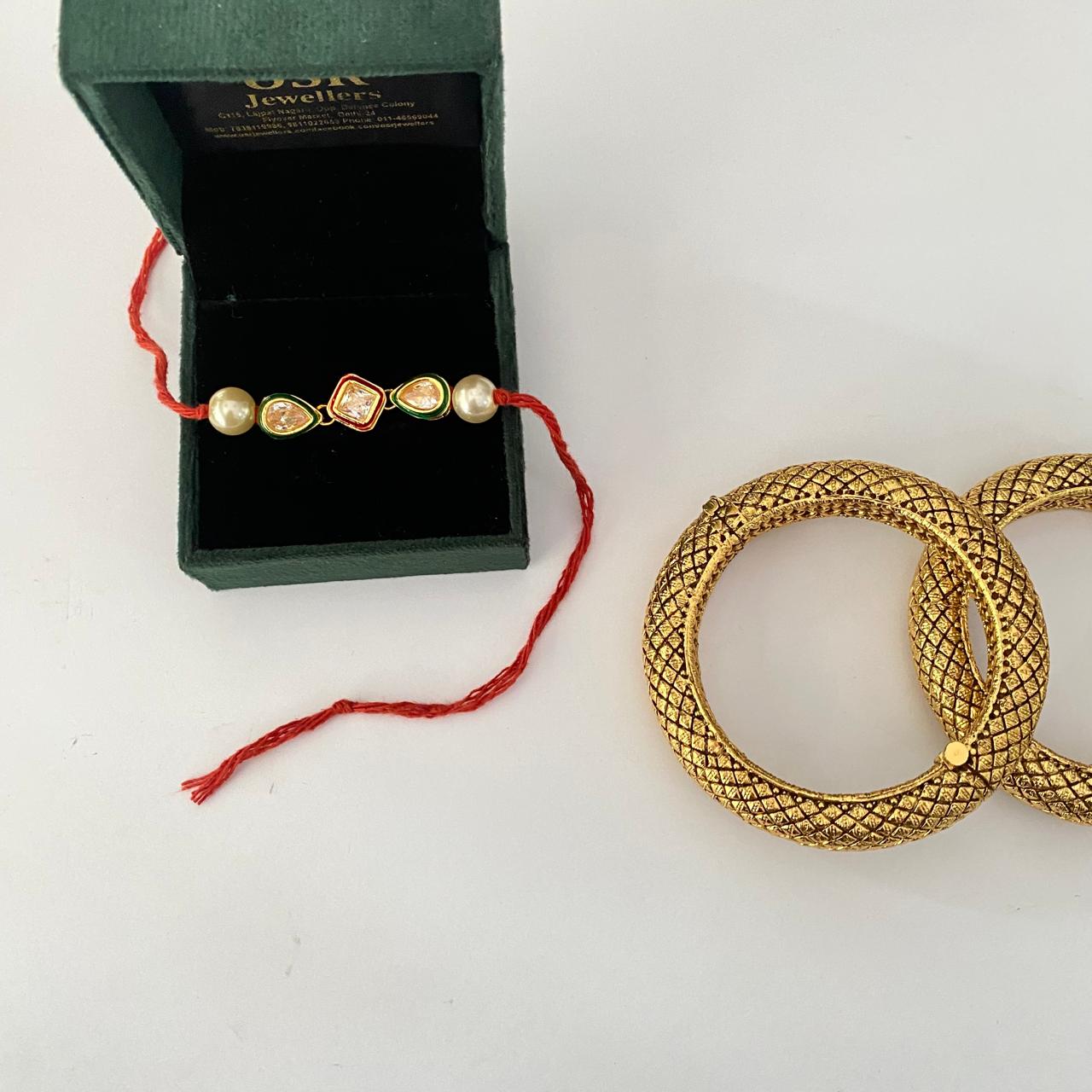 Teardrop and Square Shape Kundan with Pearl Rakhi with Gold Plated Kandani Bangle