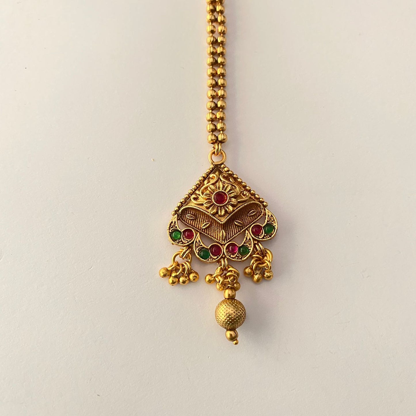 Traditional Red& green stone antique gold plated temple look small maangtikka