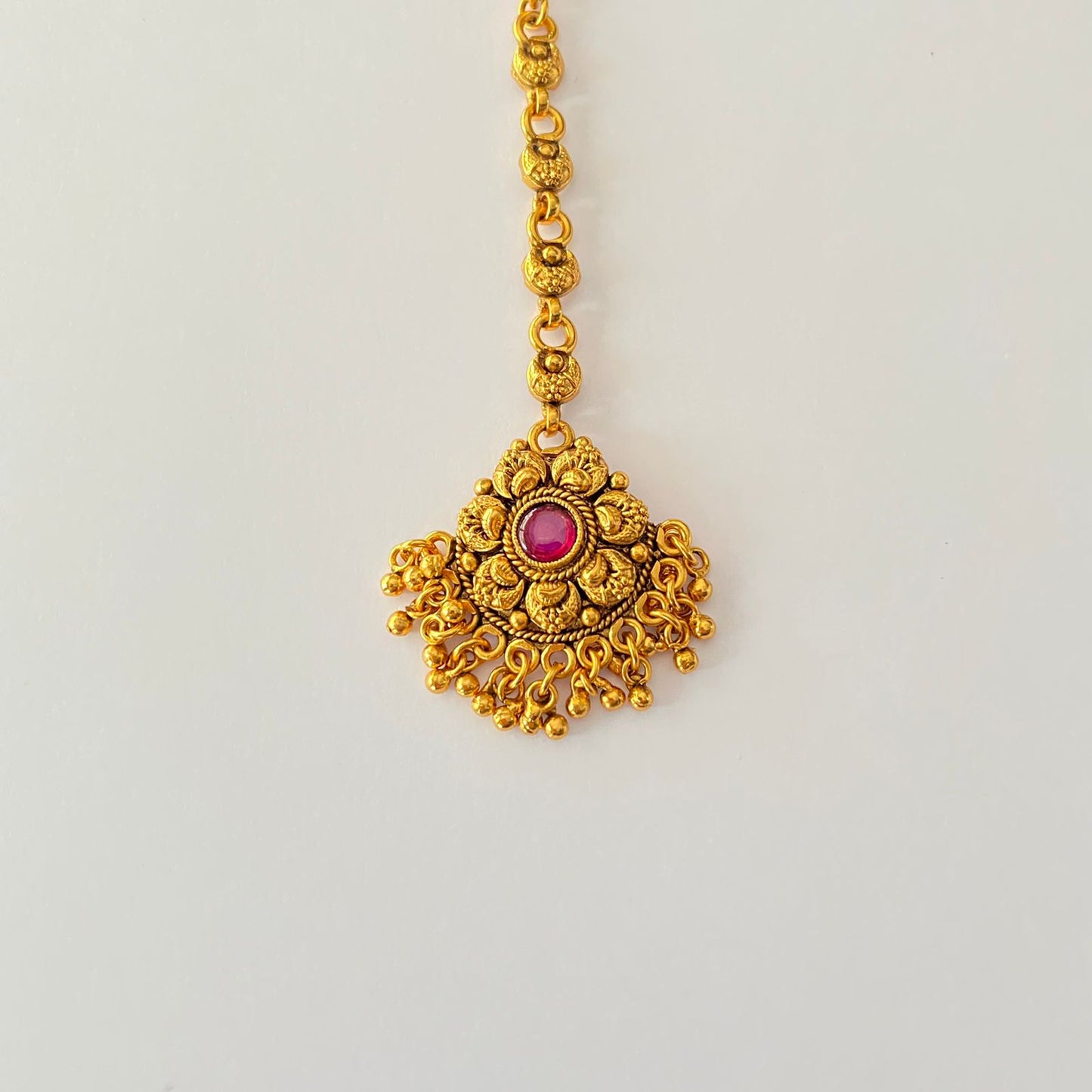 Ethnic Pink Stone Antique Gold Plated Temple mangtika