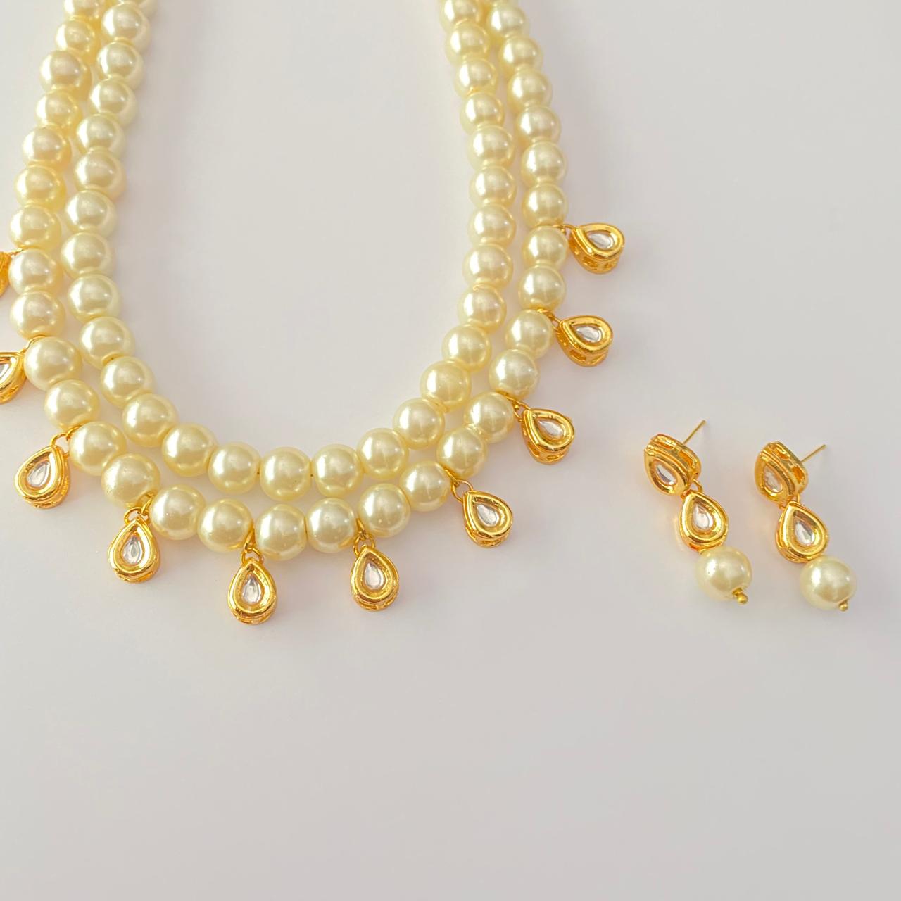Off white pearl Golden Kundan Double Line Necklace Set