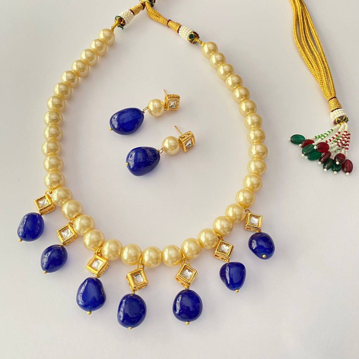 OFF WHITE PEARL BLUE SAPPHIRE KUNDAN GOLD PLATED NECKLACE WITH EARRING