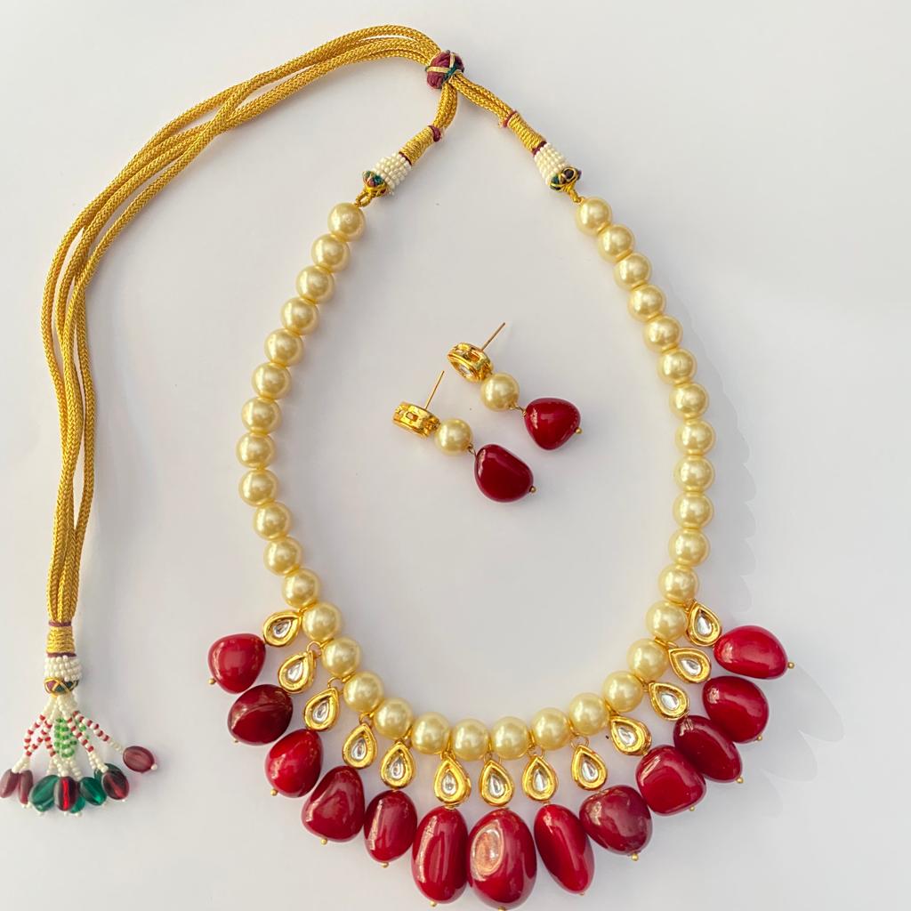 Kundan Off White Peral With  Red Stone Necklace Set