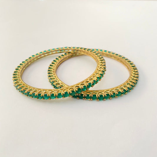 GREEN STONE GOLD PLATED BANGLE ALL SIZE ARE AVAILABLE.