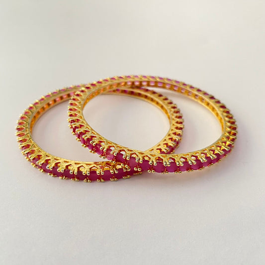 PINK STONE GOLD PLATED BANGLE ALL SIZE ARE AVAILABLE.