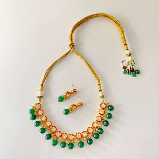 Ruby Kundan Emerald Pearl Necklace Set.