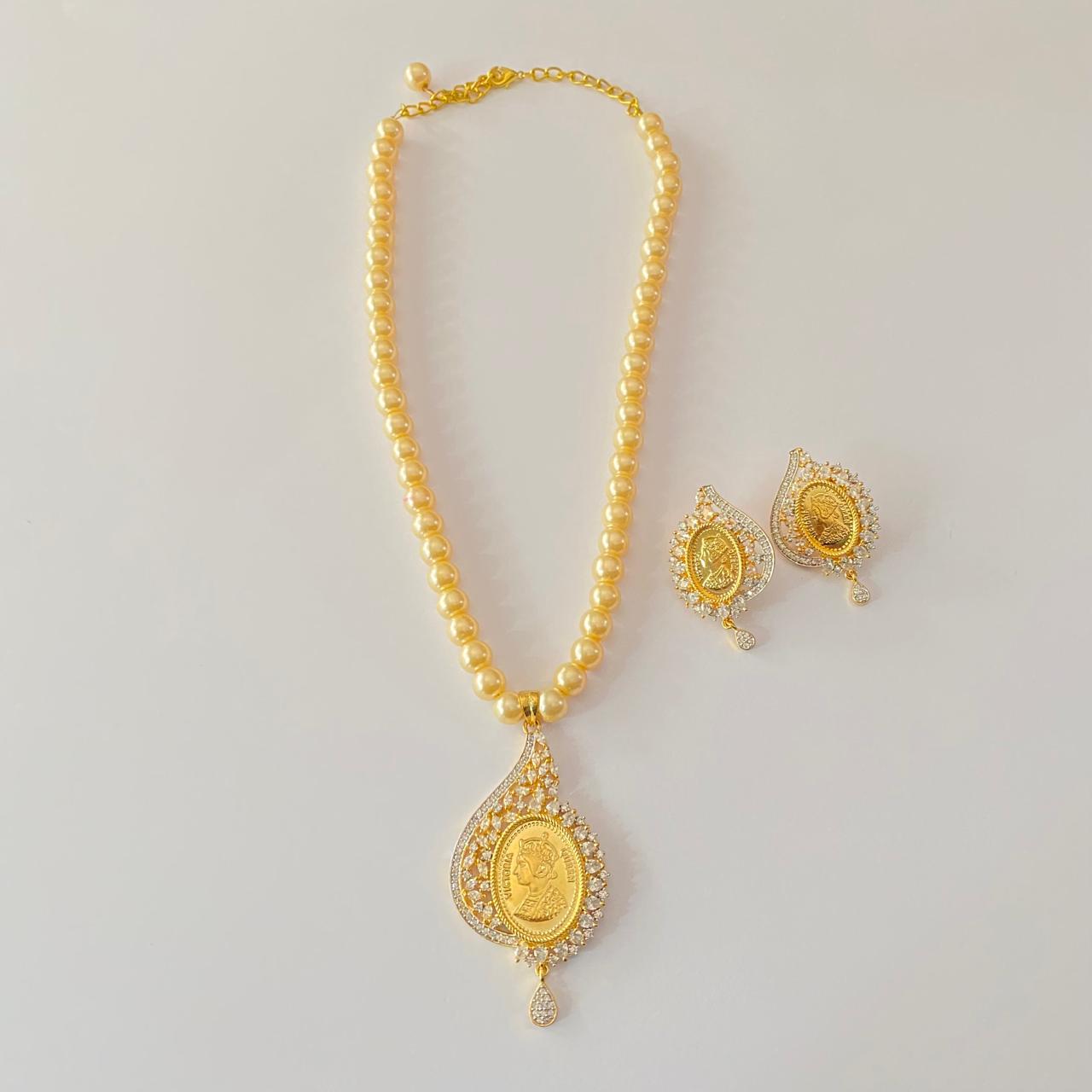 Gold Plated Gini Diamond with pearl string pendant ser