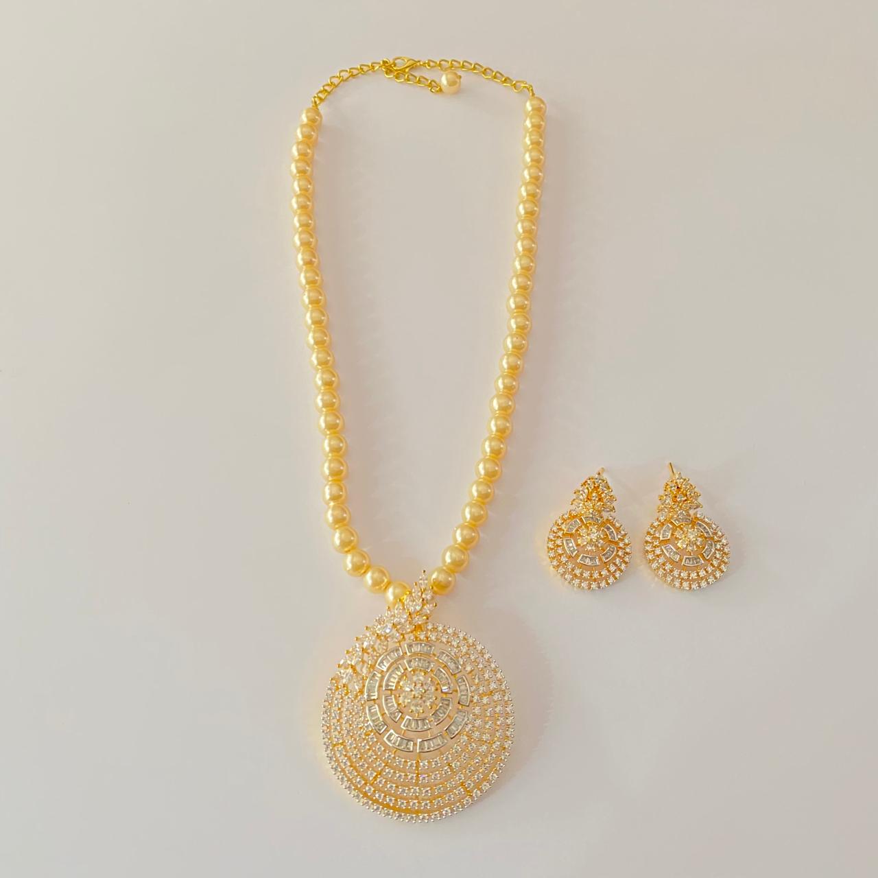 Gold Plated Gini Diamond with pearl string Big pendant ser