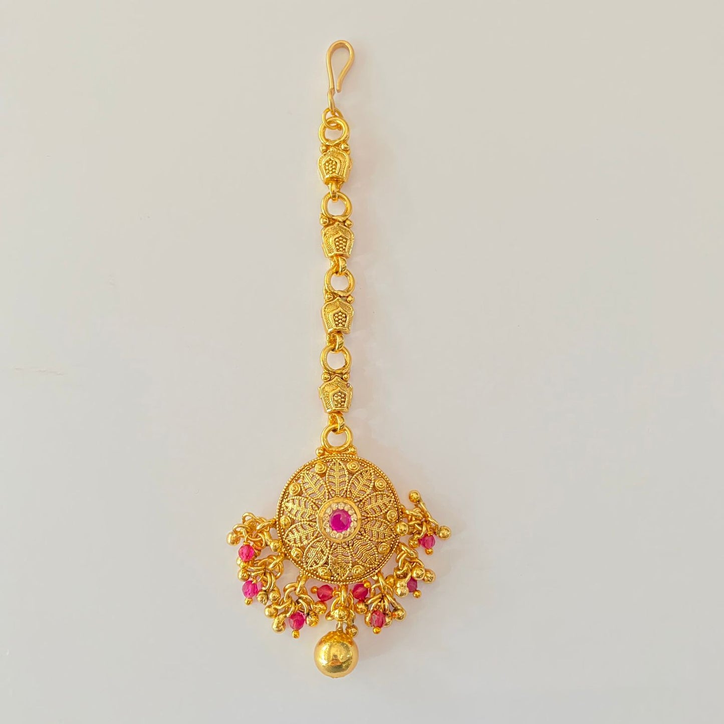 Ethnic gold plated Ruby stone mangtikka