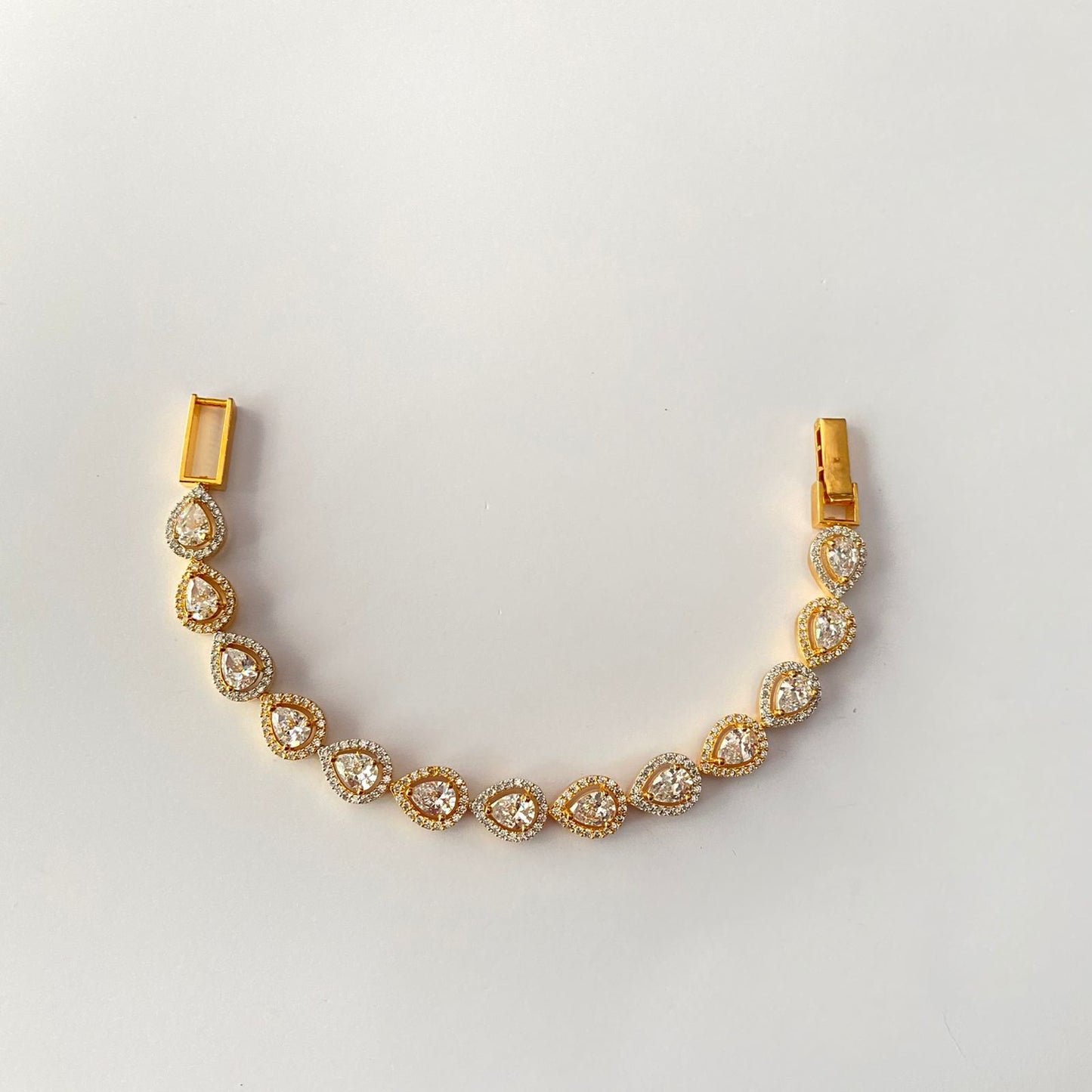 Drop shape A.D Gold Plated Tennis Bracelet.