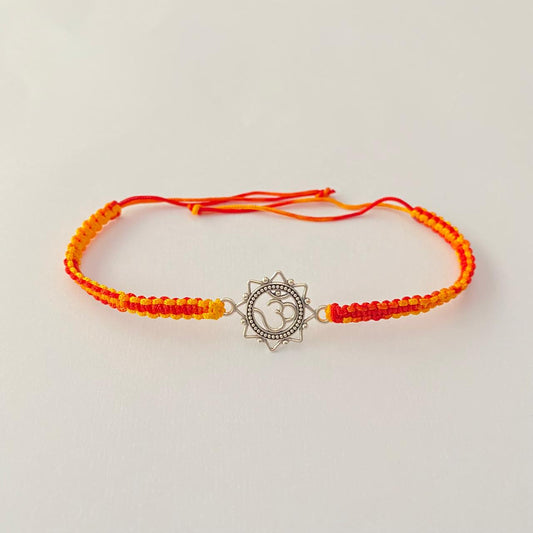 Pure silver Om Rakhi