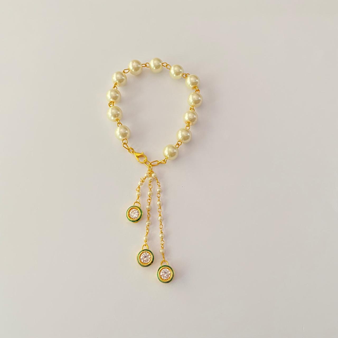 PEARL WITH KUNDAN GOLD PLATED CHAIN LUMBA RAKHI FOR WOMEN