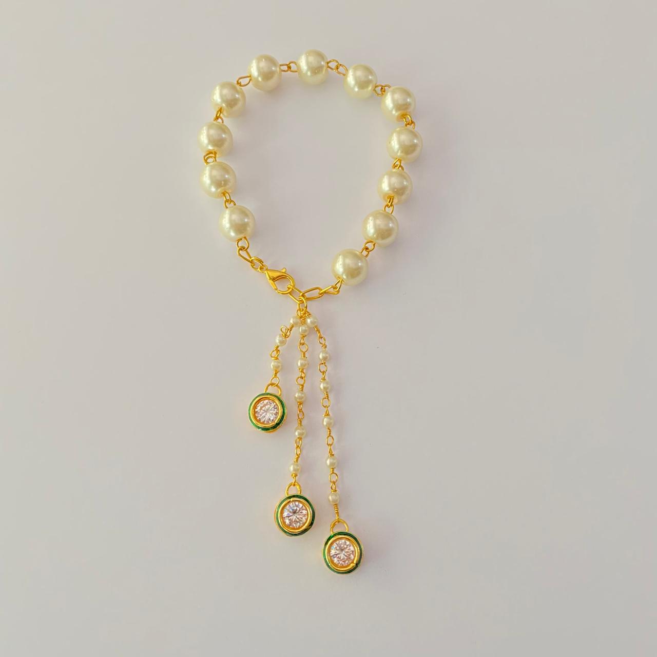 PEARL WITH KUNDAN GOLD PLATED CHAIN LUMBA RAKHI FOR WOMEN