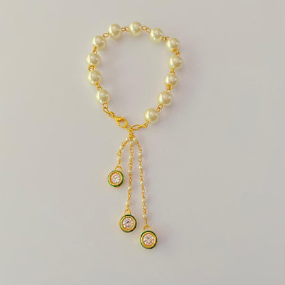 PEARL WITH KUNDAN GOLD PLATED CHAIN LUMBA RAKHI FOR WOMEN