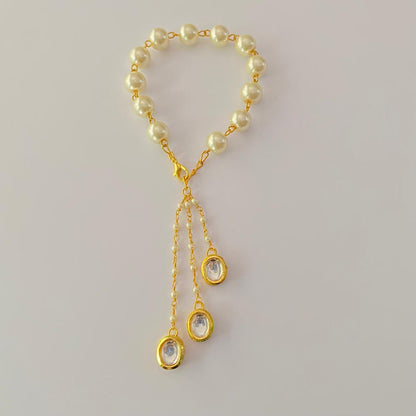OFF-WHITE PEARL  GOLD PLATED CHAIN LUMBA RAKHI FOR WOMEN
