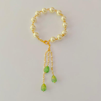 GOLD PLATED CHAIN PEARL WITH MINT GREEN LUMBA RAKHI FOR WOMEN