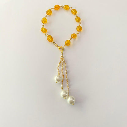 GOLD PLATED CHAIN YELLOW STONE LUMBA RAKHI FOR WOMEN