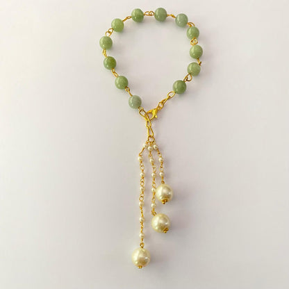 LUMBA RAKHI GREEN STONE WITH PEARL FOR WOMEN