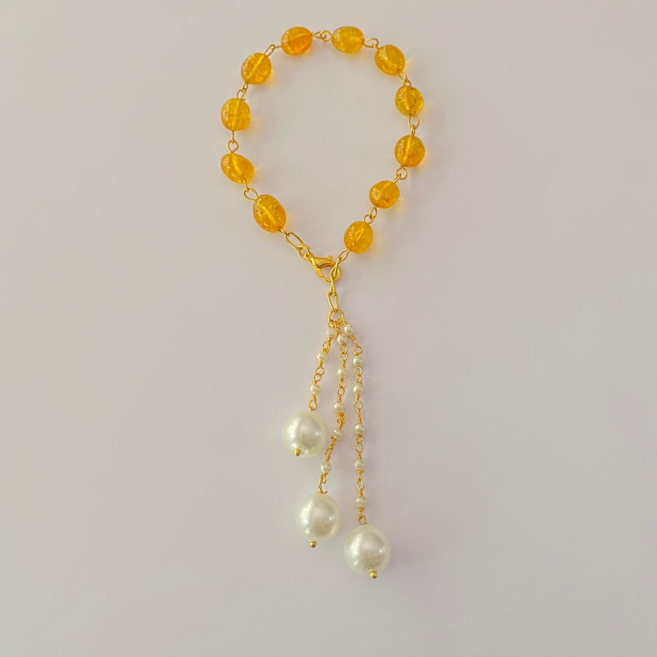 GOLD PLATED CHAIN YELLOW STONE LUMBA RAKHI FOR WOMEN