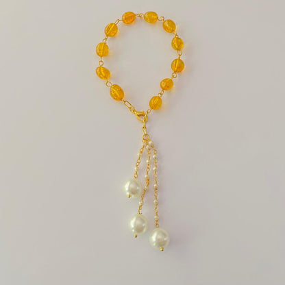 GOLD PLATED CHAIN YELLOW STONE LUMBA RAKHI FOR WOMEN