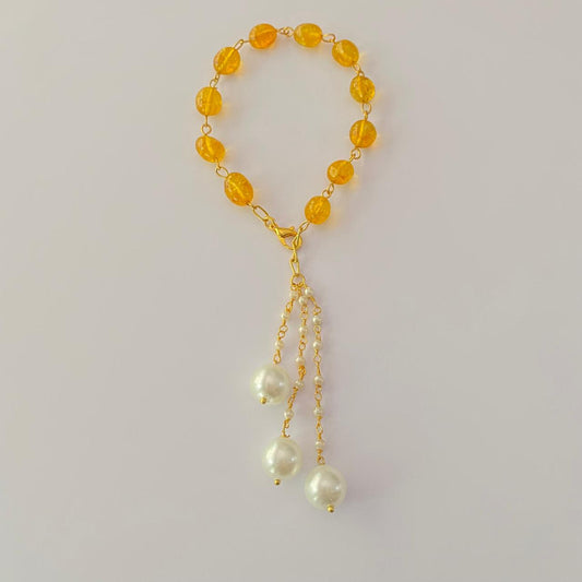GOLD PLATED CHAIN YELLOW STONE LUMBA RAKHI FOR WOMEN