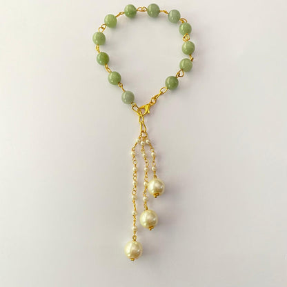 LUMBA RAKHI GREEN STONE WITH PEARL FOR WOMEN