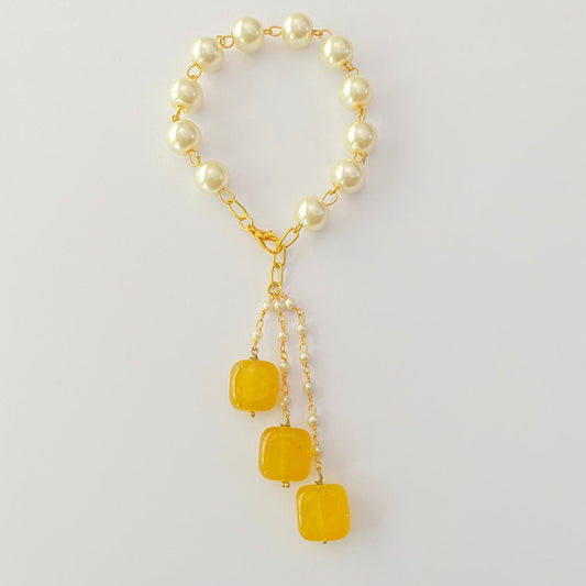 PEARL LUMBA RAKHI WITH YELLOW DROP STONE FOR WOMEN