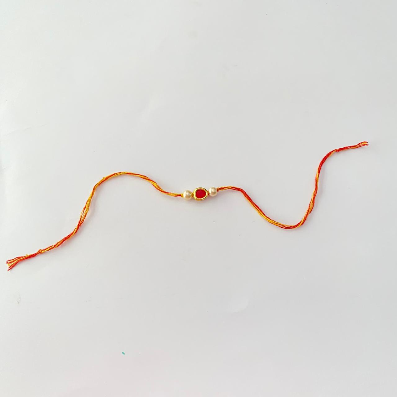 Ruby Kundan with Pearl Rakhi