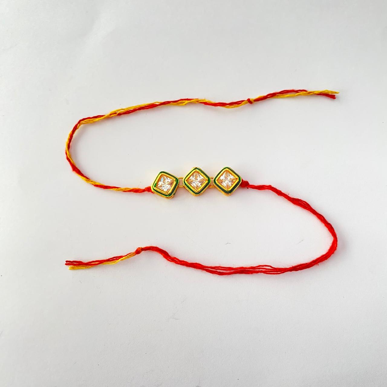 Three Square Cut White Crystals Kundan Rakhi