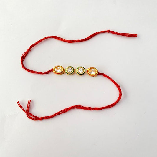Emerald & Ruby Gold Plated Kundan Rakhi