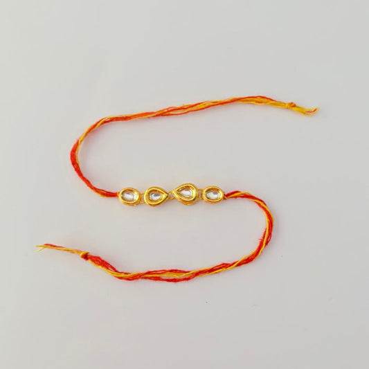 Teardrop shaped and Oval Shaped Gold Plated Kundan Rakhi