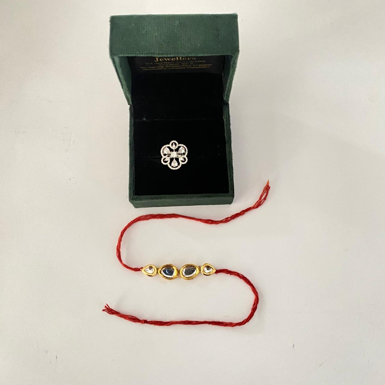 Teardrop Kundan Rakhi with Diamond Silver Plated Floral Ring Combo