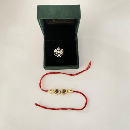 Teardrop Kundan Rakhi with Diamond Silver Plated Floral Ring Combo