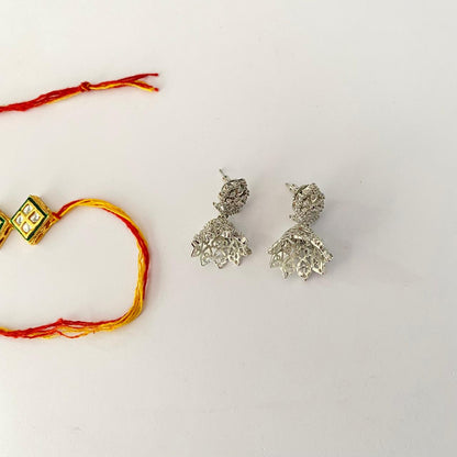 Three Square Cut Kundan Rakhi with Diamond Silver Plated Jhumka Earring Combo