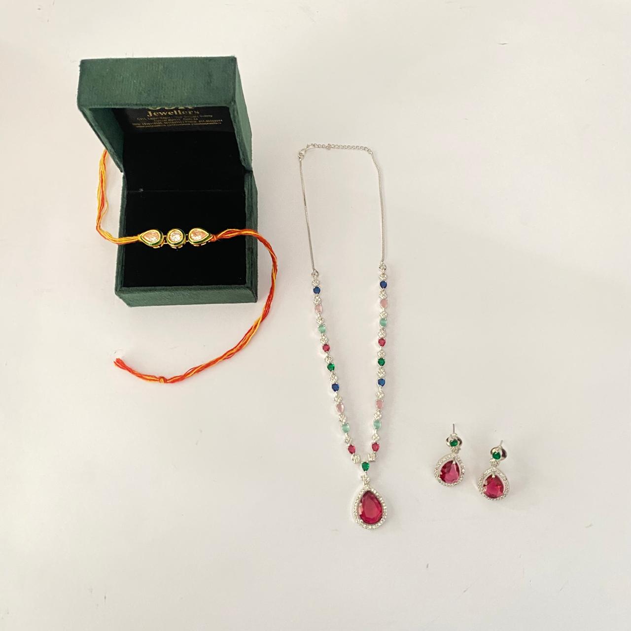 Teardrop and Round Shape Kundan Rakhi with Multi Color Diamond Silver Plated Necklace Set Combo