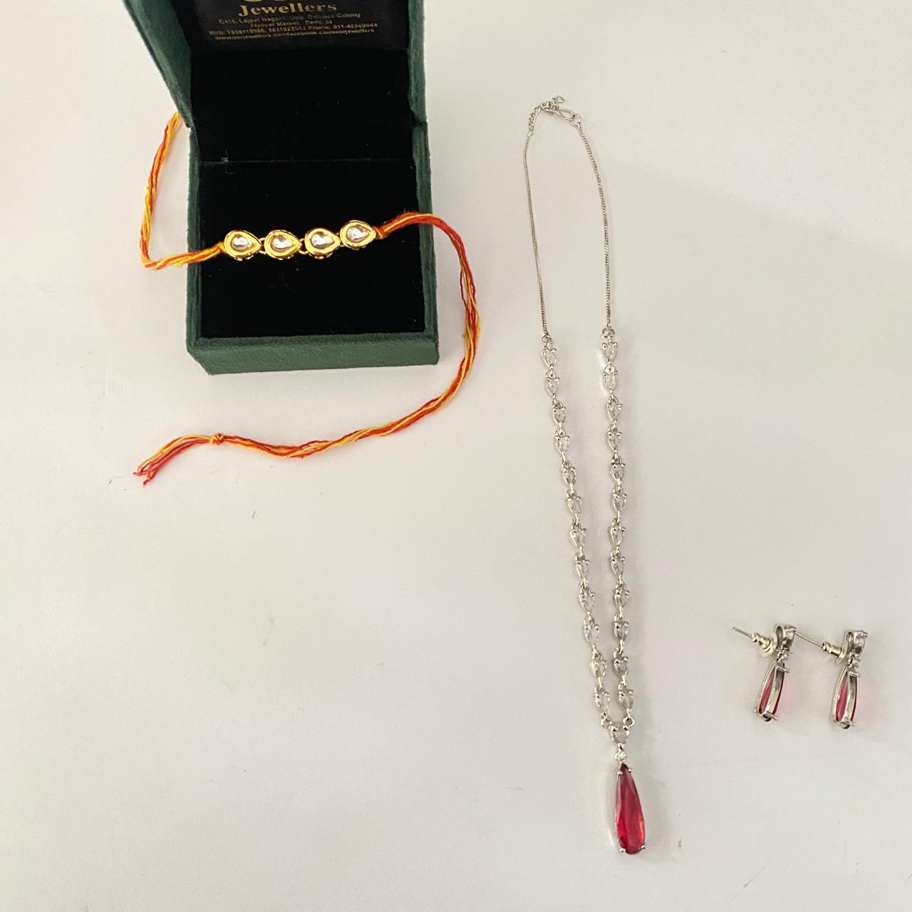 Four Teardrop Kundan Rakhi with Ruby Silver Plated Diamond Necklace Set Combo